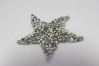 0303/15/397/01 - Emblem ,Polyester, ca. 45 mm , silber/ Strass