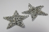 0303/15/397/01 - Emblem ,Polyester, ca. 45 mm , silber/ Strass